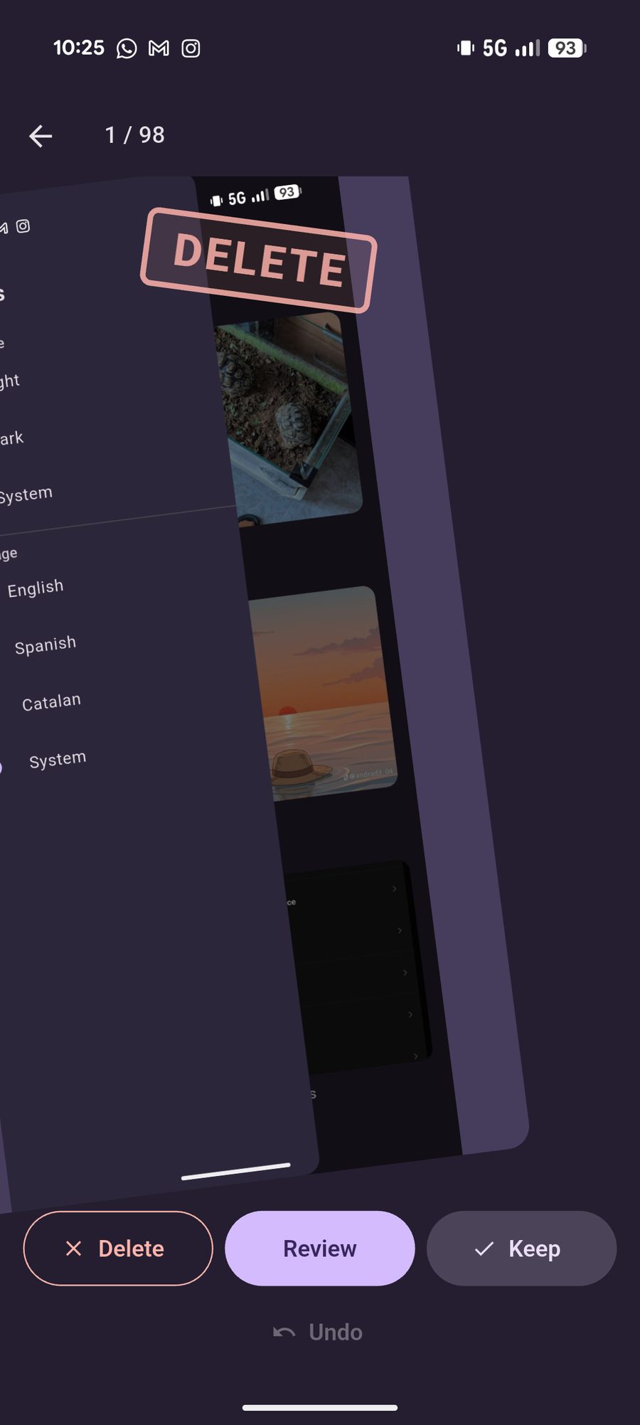 A tilted photo stamped Delete while swiping to mark it